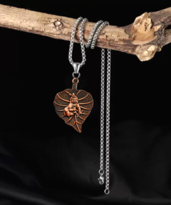 The Eternal Protector – Sacred 'Bal Krishna' Leaf Pendant in Antique Copper & Steel
