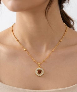 The ANVIKA Sacred Rudraksha Sunburst Pendant with Iconic Beaded Chain
